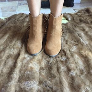 Adriana women’s side zipper fringe ankle booties